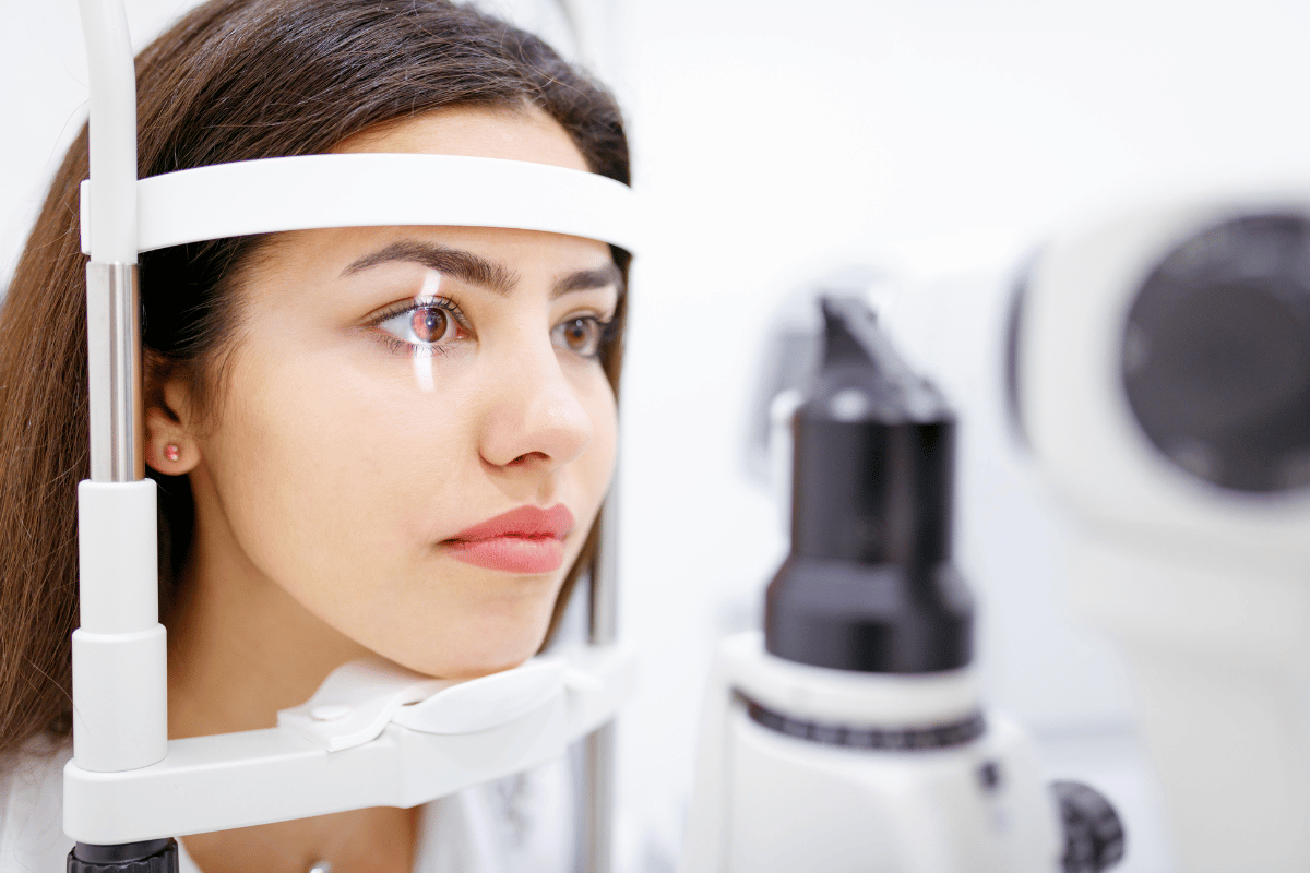 a young woman getting an eye exam