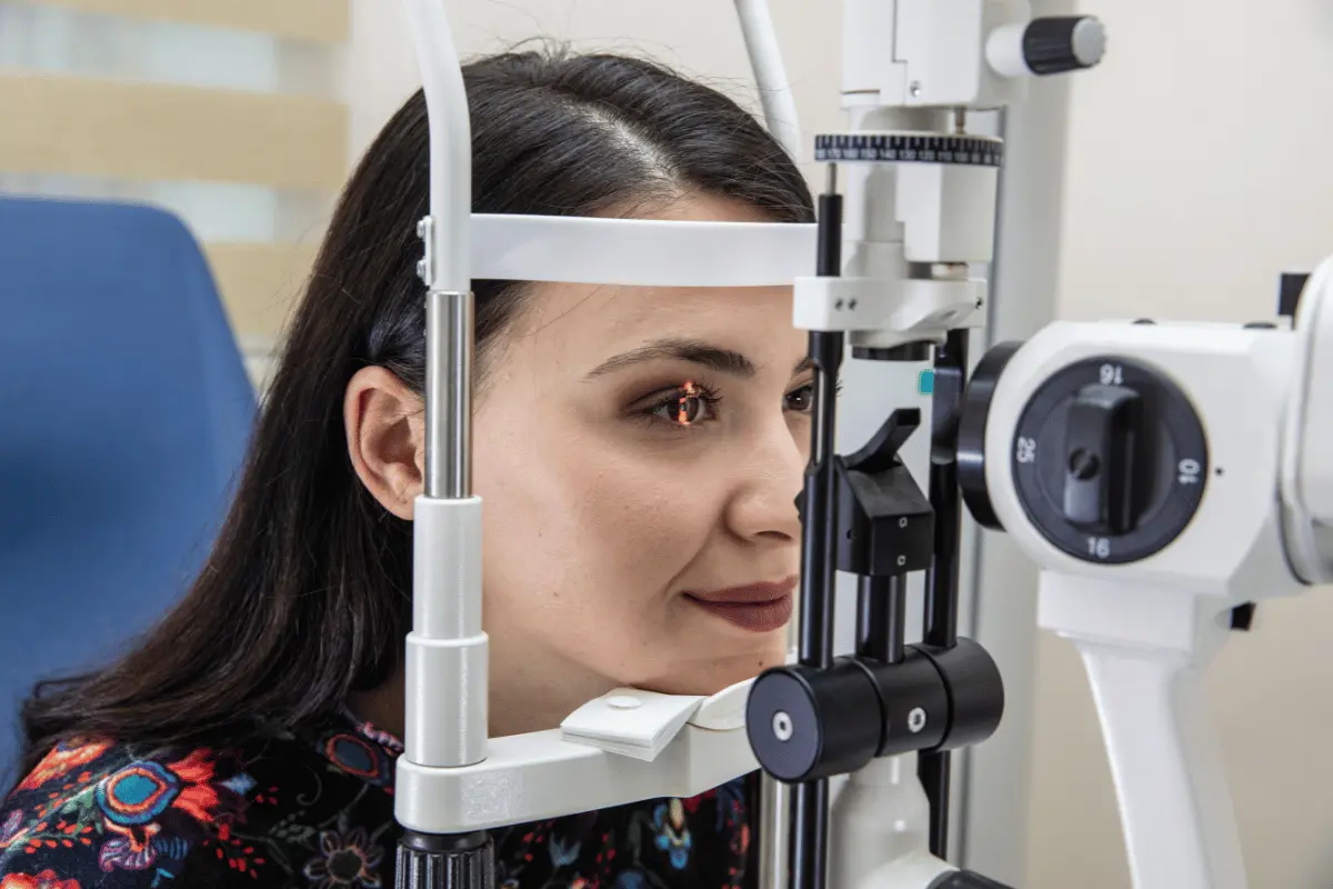a woman getting a comprehensive eye exam